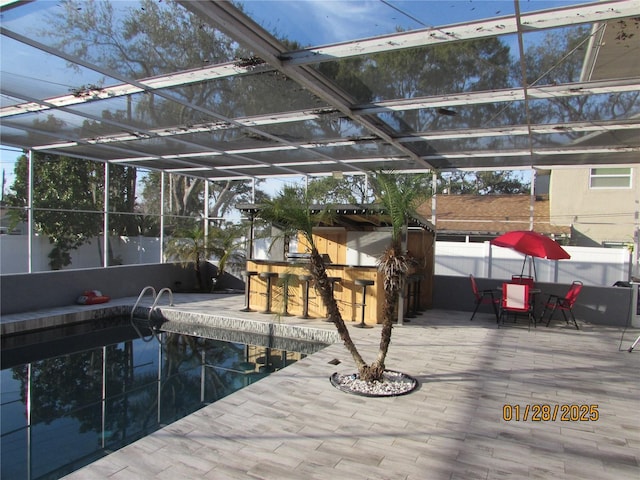5006 Monet Ave, Belle Isle, FL 32812 - view of pool with exterior bar, glass enclosure, and a patio area