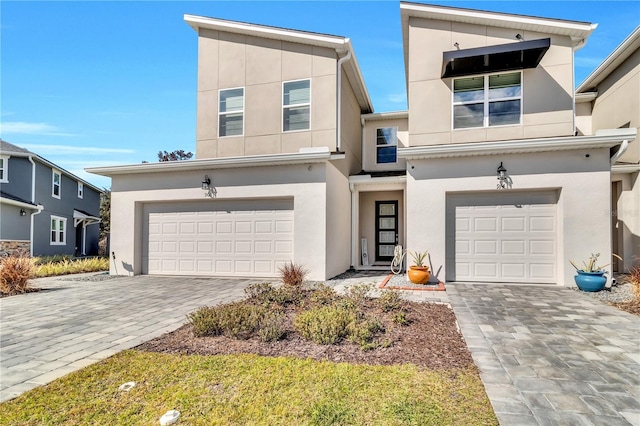 view of front of property with a garage