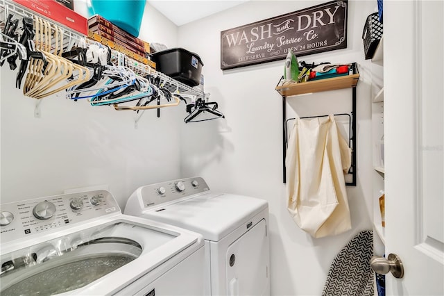 washroom with separate washer and dryer