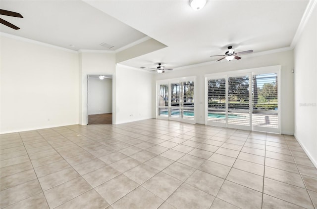 unfurnished room with ceiling fan, ornamental molding, and light tile patterned floors