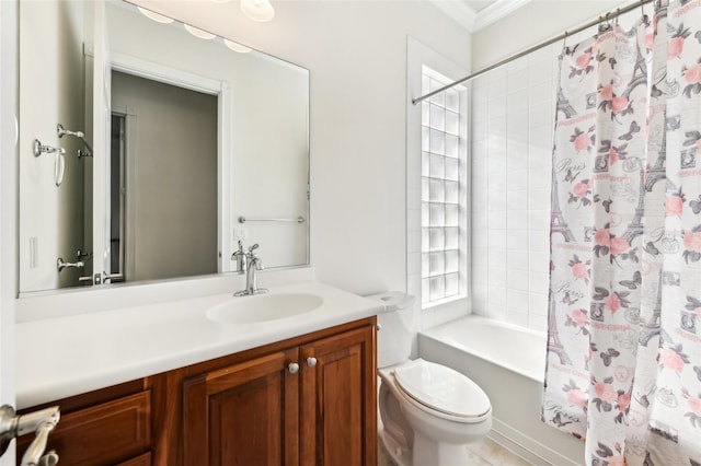 full bathroom with vanity, ornamental molding, shower / tub combo, and toilet