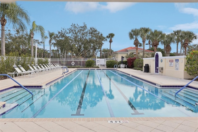 view of swimming pool featuring a patio area