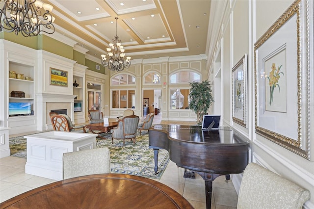 interior space with built in shelves, coffered ceiling, a chandelier, ornamental molding, and a high ceiling