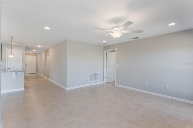 empty room with ceiling fan