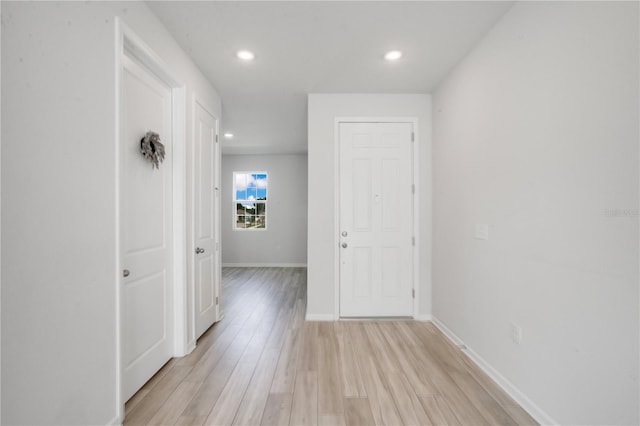 hallway featuring light hardwood / wood-style flooring