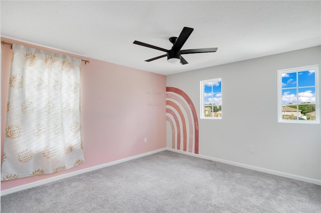 332 Bow Ln, Haines City, FL 33844 - unfurnished room featuring carpet floors, baseboards, and a ceiling fan