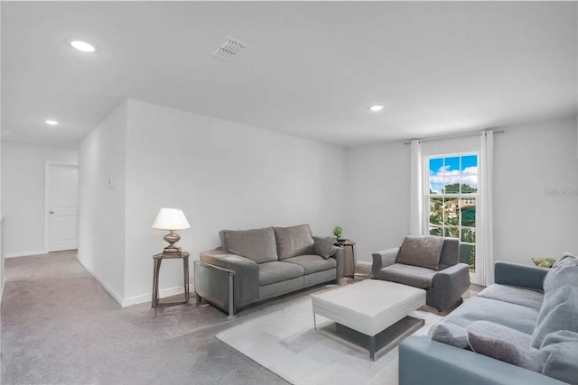 332 Bow Ln, Haines City, FL 33844 - living room with visible vents, concrete floors, baseboards, and recessed lighting