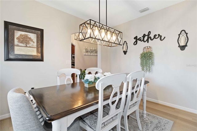 dining room featuring light hardwood / wood-style flooring