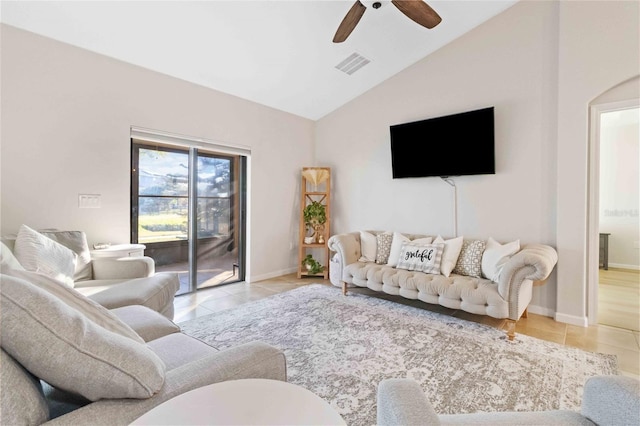 tiled living room with vaulted ceiling and ceiling fan