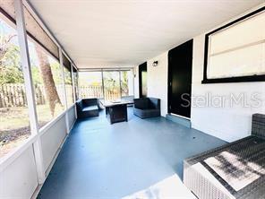 unfurnished sunroom with a healthy amount of sunlight