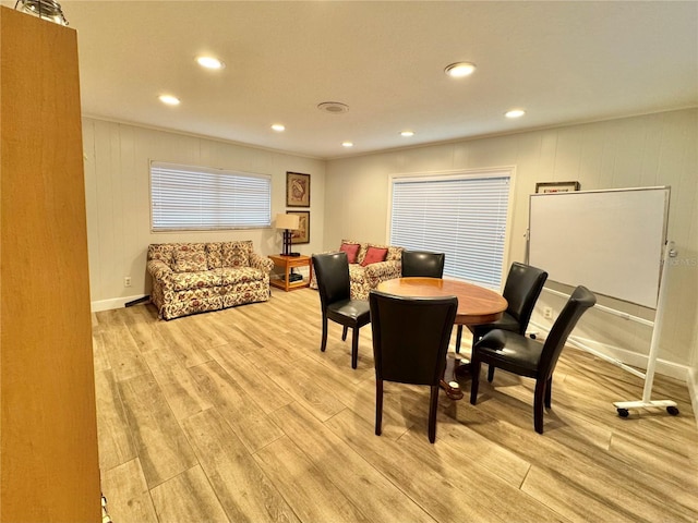 dining space featuring light hardwood / wood-style floors