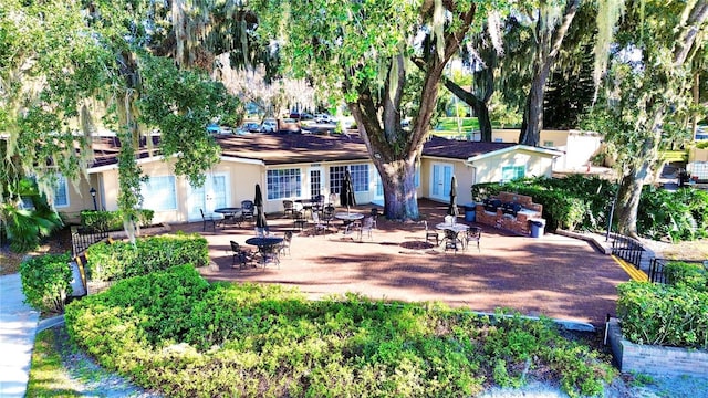 back of property with a patio area