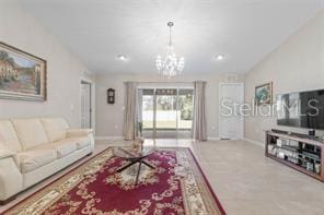 living room featuring an inviting chandelier