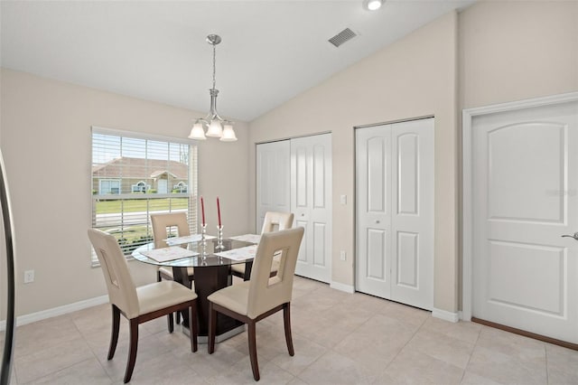 dining space with lofted ceiling, light tile patterned floors, visible vents, baseboards, and an inviting chandelier