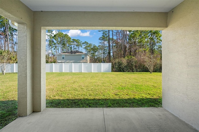 view of yard with a patio area and fence