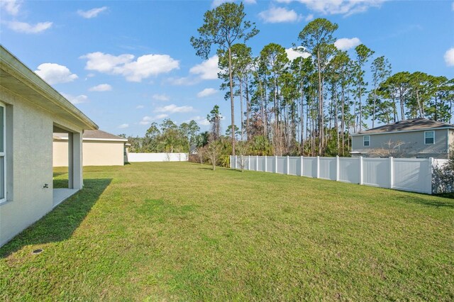 view of yard with fence