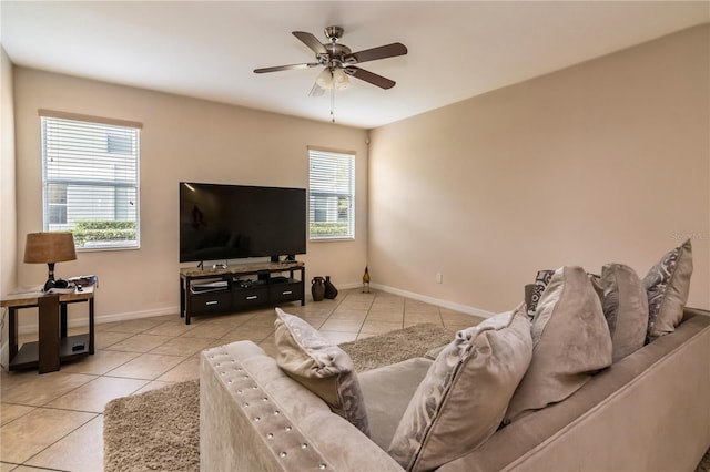 tiled living room featuring ceiling fan