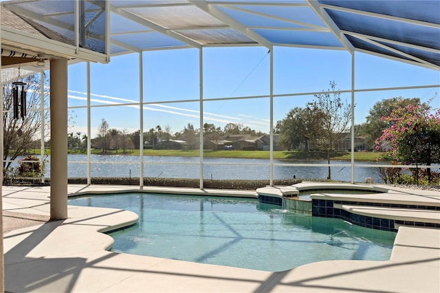 view of swimming pool featuring a patio, a lanai, a water view, and an in ground hot tub