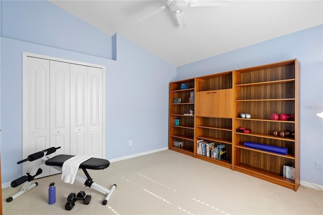 exercise room with lofted ceiling, carpet flooring, and ceiling fan