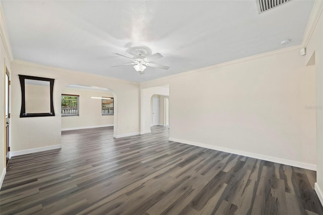 unfurnished room featuring ornamental molding, dark hardwood / wood-style floors, and ceiling fan