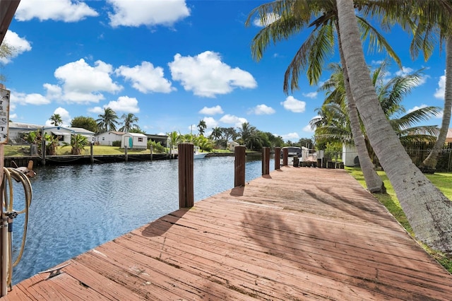 dock area with a water view