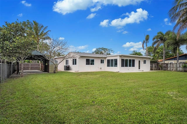 rear view of house with a gazebo, a lawn, and central air condition unit