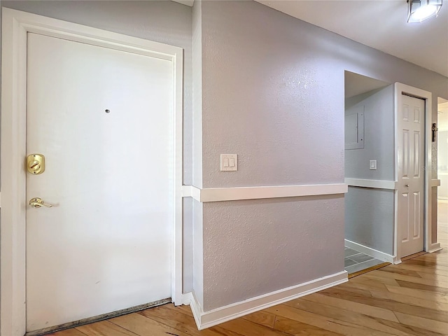 hallway featuring hardwood / wood-style floors