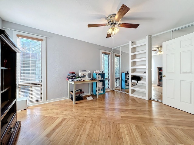 office area featuring ceiling fan and light hardwood / wood-style floors