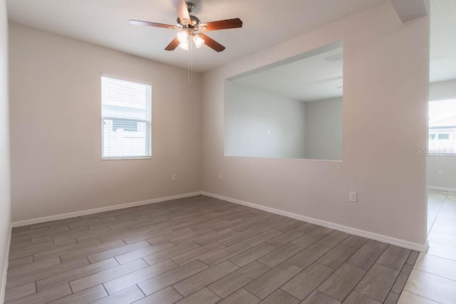 unfurnished room featuring ceiling fan