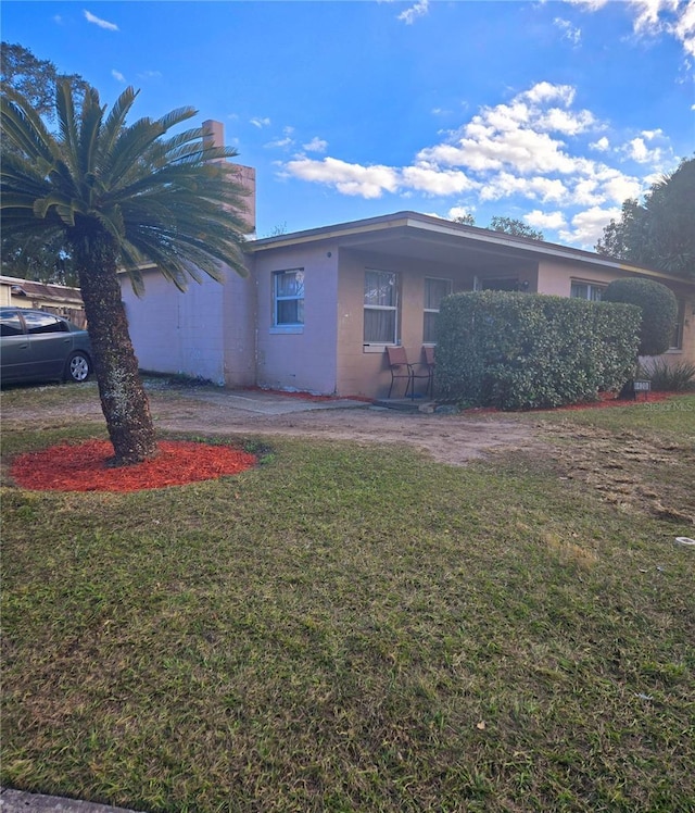 view of front of home with a front yard