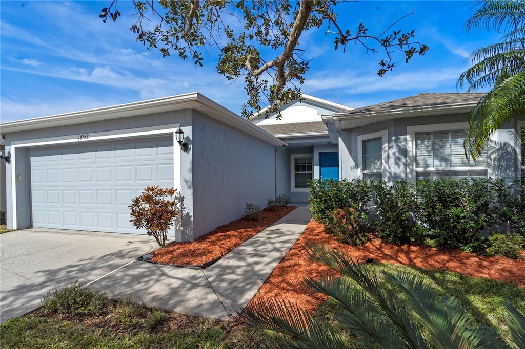 single story home with a garage