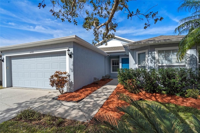 single story home with a garage