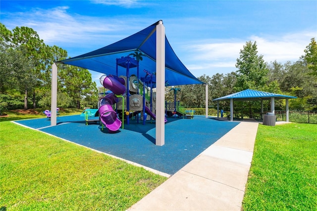 view of playground featuring a gazebo and a lawn