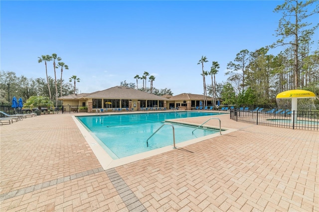 view of swimming pool with a patio