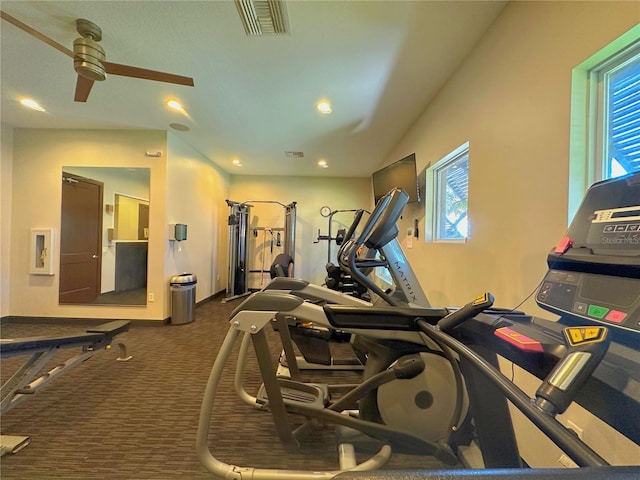 exercise room with recessed lighting, a healthy amount of sunlight, visible vents, and carpet flooring