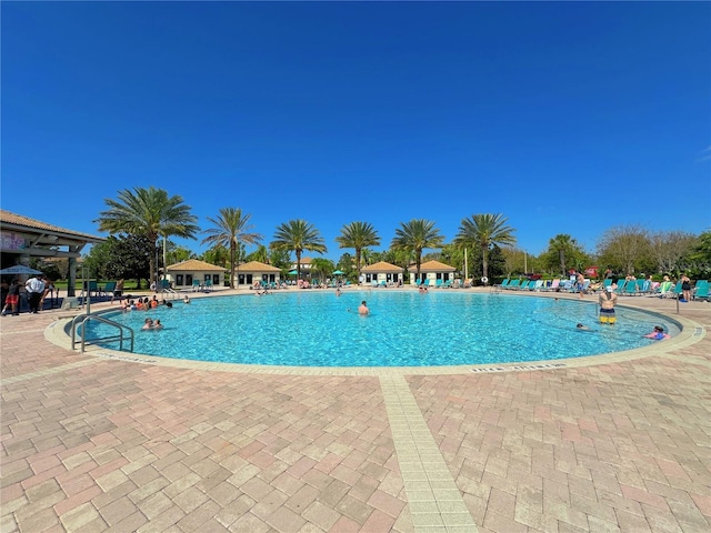 pool with a patio