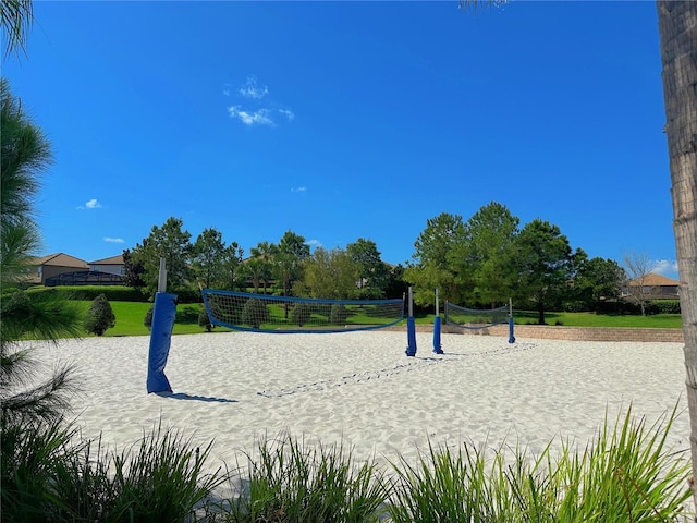 view of property's community featuring volleyball court