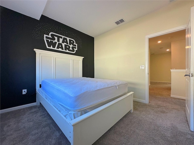 bedroom featuring carpet, visible vents, and baseboards