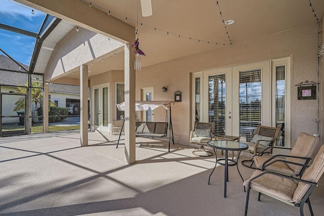 view of patio with a lanai