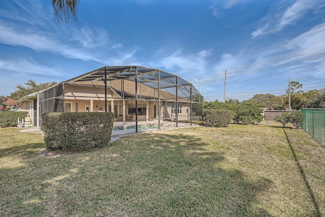 view of yard with a lanai