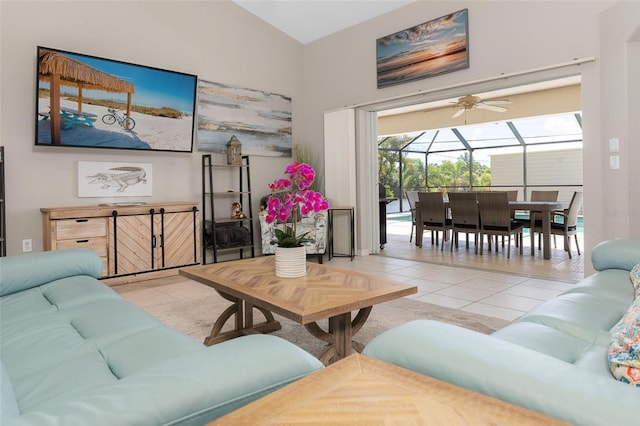 tiled living room with ceiling fan