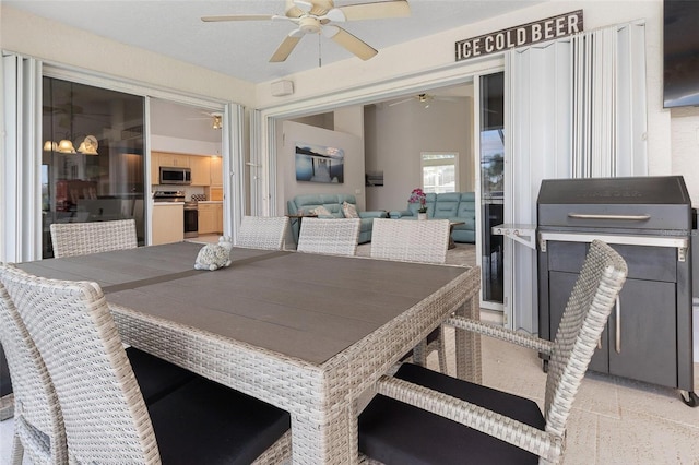 dining space with ceiling fan