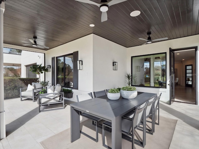 view of patio featuring an outdoor living space and ceiling fan