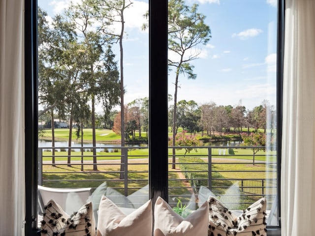 doorway to outside featuring a water view