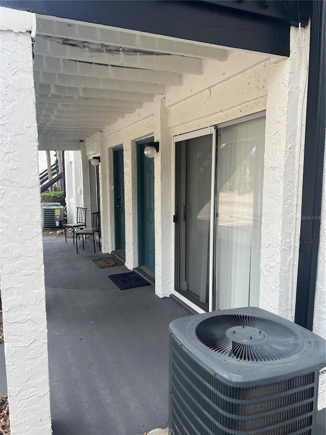 view of patio featuring cooling unit