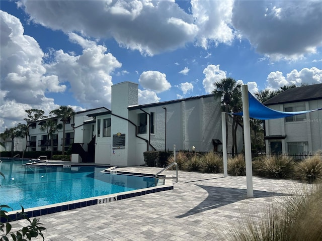 view of pool featuring a patio area