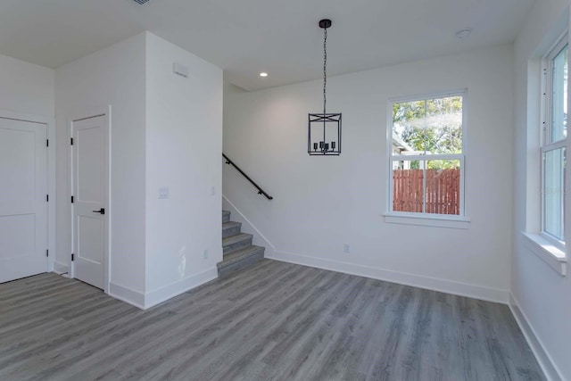 empty room with light hardwood / wood-style floors