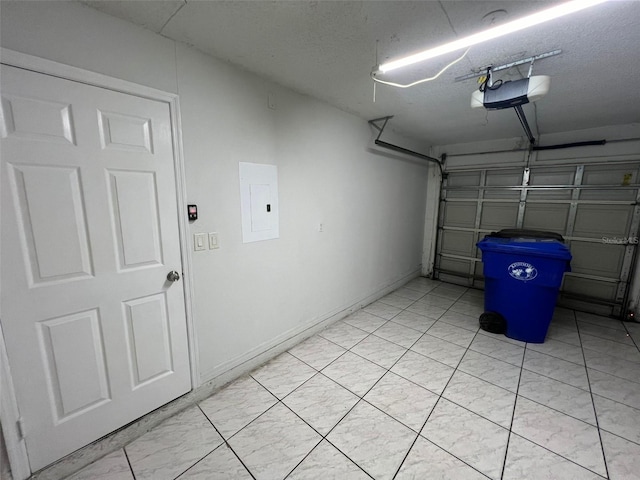 garage featuring a garage door opener and electric panel