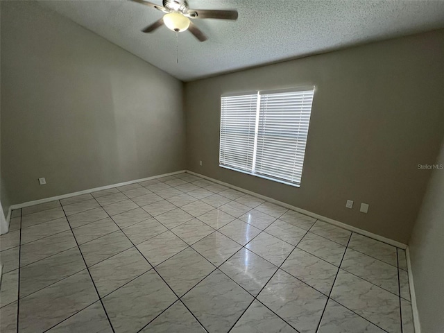 unfurnished room featuring a textured ceiling and ceiling fan