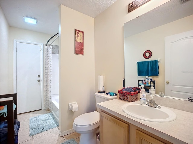 full bathroom with tile patterned floors, toilet, a textured ceiling, vanity, and shower / bath combo with shower curtain